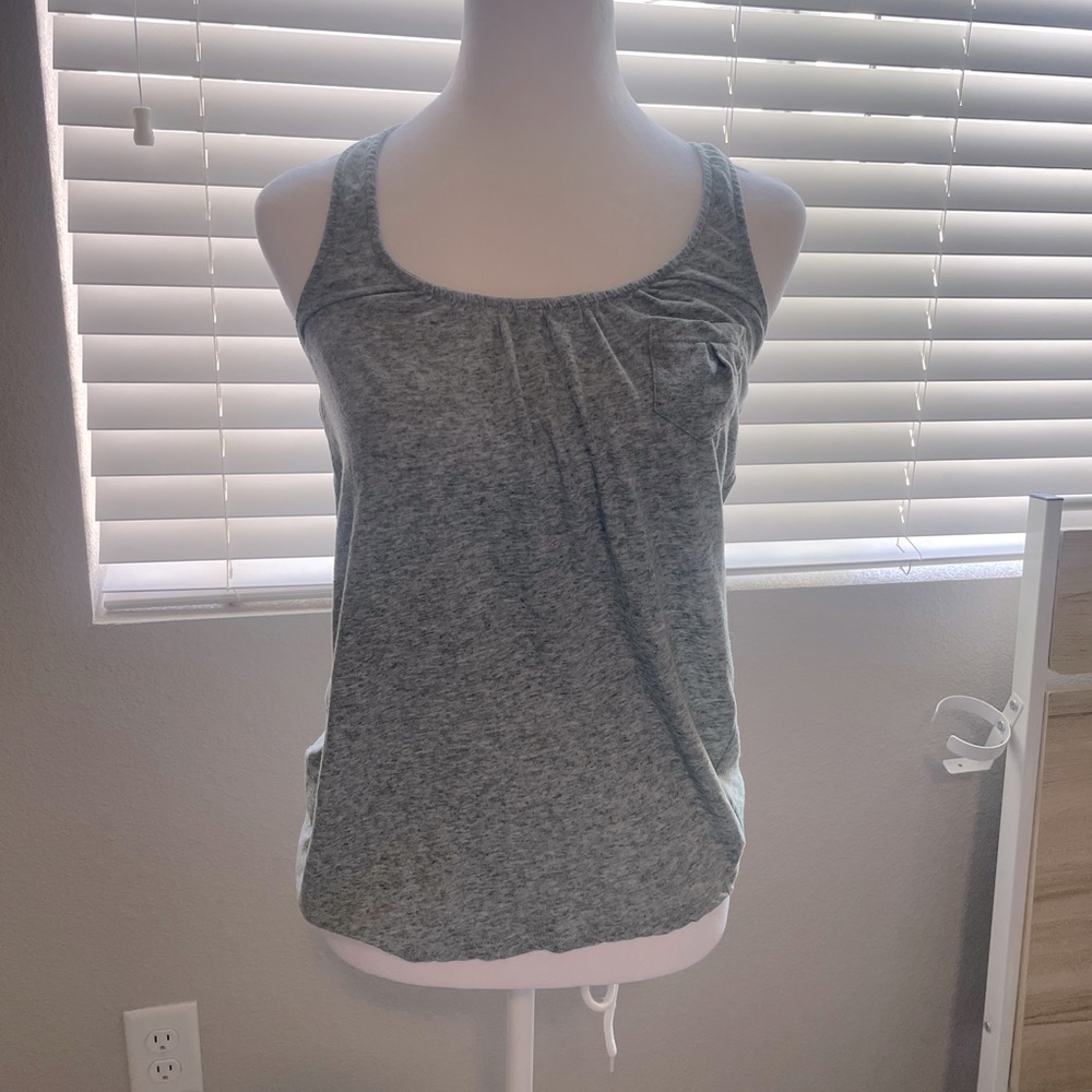 Button/Pocket Tank